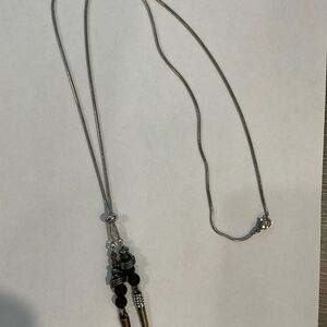 Long chain with hanging charms
